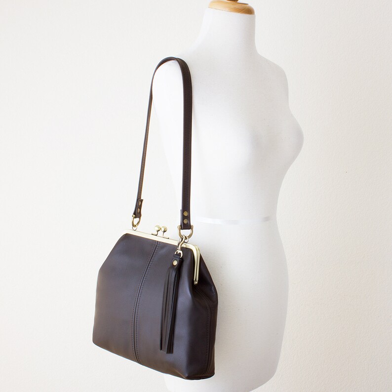 leather kiss lock handbag