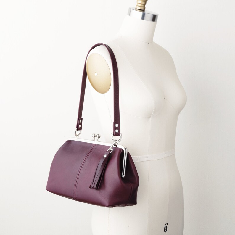 leather kiss lock handbag