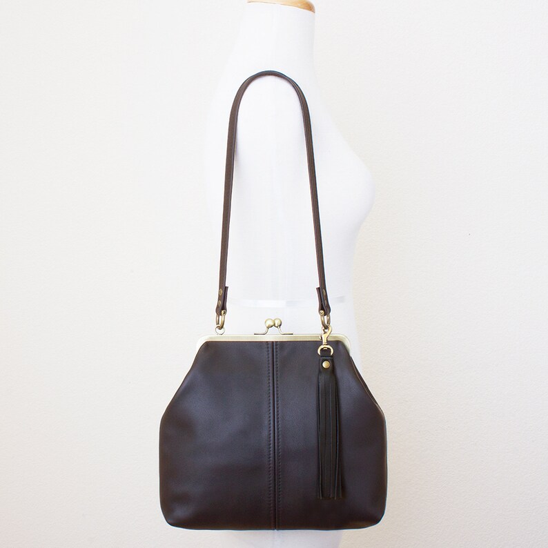 leather kiss lock handbag