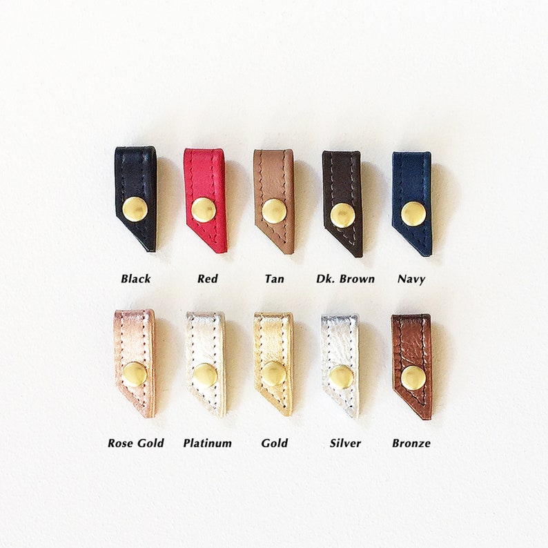 Set of ten leather cord keepers with button snap closures in a variety of colors with text describing leather color options.
