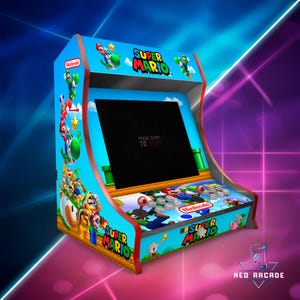 May include: A Super Mario arcade cabinet with a blue and red design. The cabinet features a black screen with the text "PRESS START TO PLAY". The cabinet has a Nintendo logo and Super Mario characters.