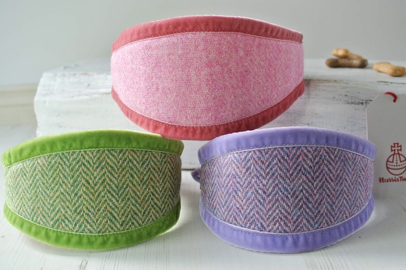 May include: Three dog collars with different patterns and colors. The collars are made of tweed fabric with a velvet trim. The collars are pink, green, and purple.