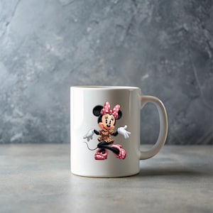 May include: White ceramic mug featuring a cartoon illustration of Minnie Mouse. Minnie Mouse is depicted in a leopard print dress, pink polka dot bow, and shoes. The mug has a curved handle and is set against a gray background.