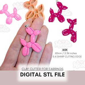 以下が含まれることがあります： ピンクの風船犬のイヤリングと粘土カッター。イヤリングの長さは6cmです。画像には「CLAY CUTTER FOR EARRINGS」と「DIGITAL STL FILE」の文字も含まれています。