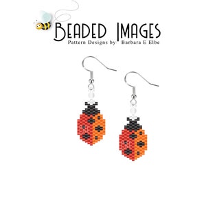 May include: A pair of silver earrings with a beaded ladybug design. The ladybugs are red with black spots and white accents.