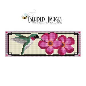 May include: A beaded cross stitch pattern featuring a green hummingbird with a long beak, hovering near two pink flowers with yellow centers. The pattern is framed with a black and white border.