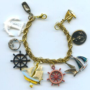 Nautical Theme Charm Bracelet With Collectible Charms Mermaid Ships Seagull Anchors