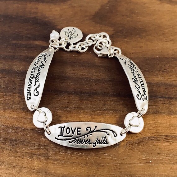 Love never fails bracelet deals