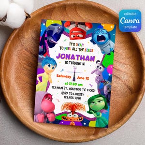 May include: A colorful birthday invitation featuring characters from the movie "Inside Out." The invitation includes the text "It's okay to feel all the feels" and "Jonathan is turning 4!" The design is set on a wooden plate.