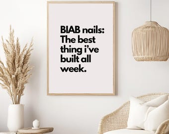 May include: A framed print with the text "BIAB nails: The best thing I've built all week."