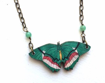 Butterfly necklace green red white wings with blue crystal beads vintage ephemera Victorian style paper wood Dishfunctional Designs