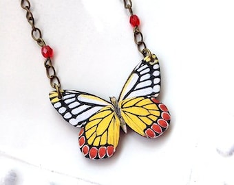 Butterfly necklace white yellow and red with black, chain with red crystal beads