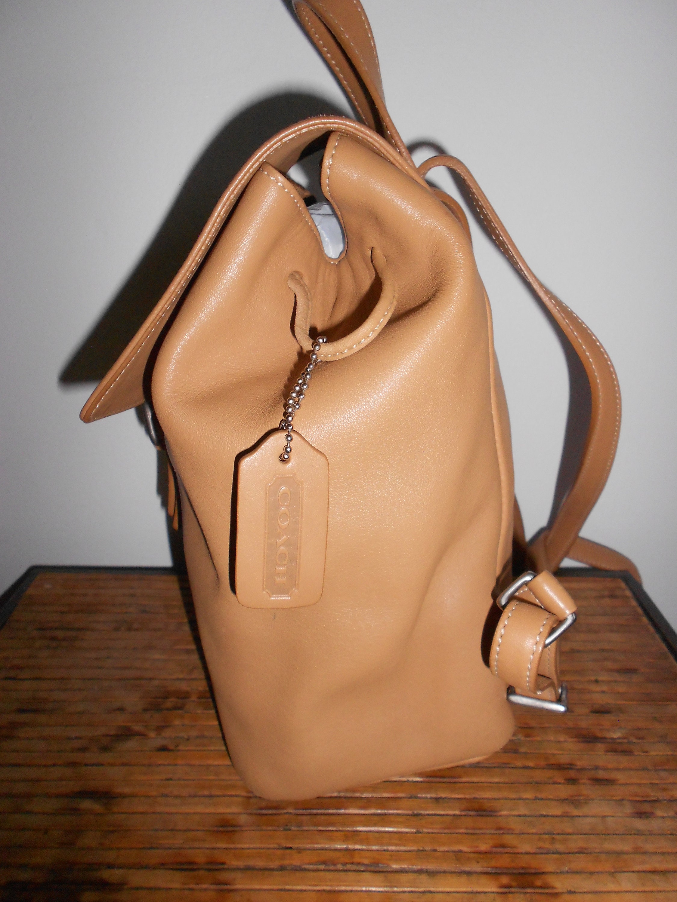 Coach backpack pink and tan hotsell