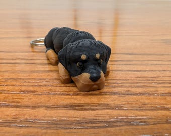 Rottweiler, fully articulated flexi Rottie guard dog keychain. Explore our whole line of Littles