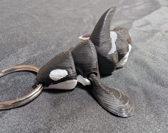 Little Orca Killer Whale fully articulated flexi keychain. Ready to explore the oceans of the world. Check out our whole line of Littles