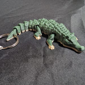 Alligator / Crocodile Articulated Flexi Keychain. Time to go carnivore. gator, croc, modern dinosaurs. Explore our whole line of Littles