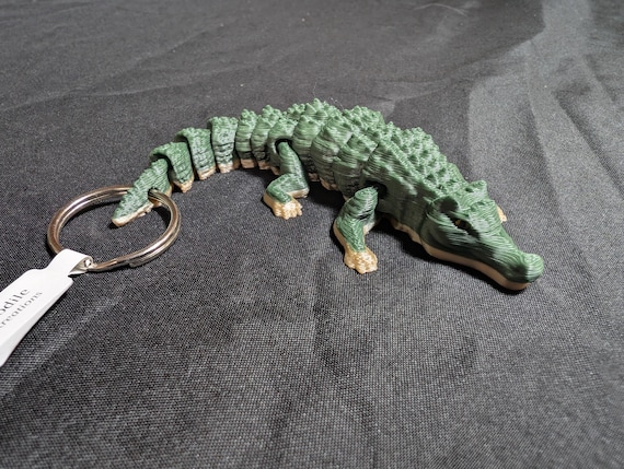 Alligator / Crocodile Articulated Flexi Keychain. Time to go carnivore. gator, croc, modern dinosaurs. Explore our whole line of Littles