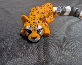 Cheetah big wild cat fully articulated flexi keychain. Ready to explore the jungle wilds hunt and explore. Explore our whole line of Littles