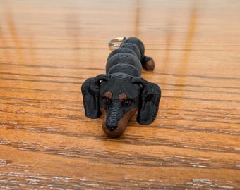 Dachshund Black brown 2-tone, fully articulated flexi wiener dog keychain. Explore our whole line of Littles
