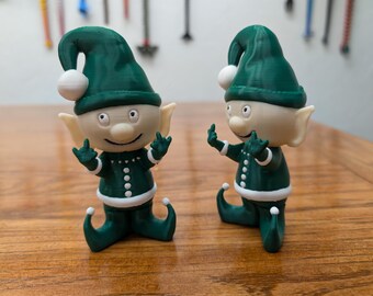 Sassy Elf: The Humorous Side of Holiday Decorations Santa's little helper—or not!