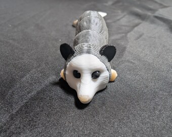 Grumpy little opossum articulated flexi keychain. Ready to explore the garbage cans and yard. possum Check out our whole line of Littles