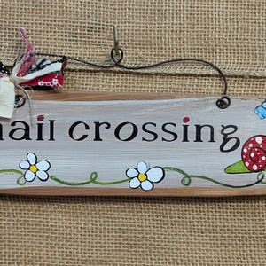 Snail crossing hand painted wooden sign