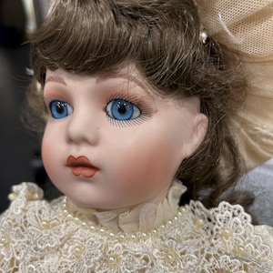 Poupée de collection en porcelaine Franklin