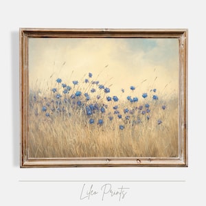 May include: A framed painting depicting a field of blue wildflowers in a field of tall grass. The background is a soft yellow and blue.