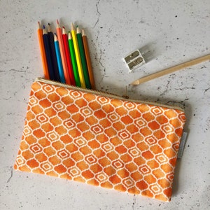 Bright Orange Pencil Case, Alta fabric, waterproof lining, brass zip, geometric trellis design, made in the UK, school and office supplies