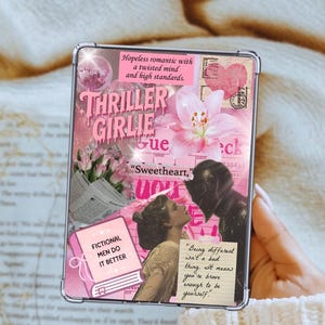 May include: A clear phone case featuring a collage design with pink and white elements. The design includes the text "Thriller Girlie" and "Fictional Men Do It Better", along with other text and images of flowers and a couple.