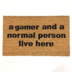 a GAMER and a normal person live here | funny nerdy door mat | geeky doormat | boyfriend gift for him | doormatt