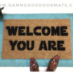 Promotional graphic for an all natural, sustainable, eco-friendly coir doormat made by Damn GoodDoormats