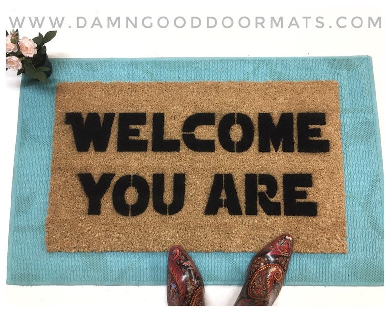 Promotional graphic for an all natural, sustainable, eco-friendly coir doormat made by Damn GoodDoormats