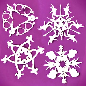 4 Elvis paper snowflake templates. Snowflake templates, step by step instructions. Homemade DIY Elvis snowflake decorations by Happythought.