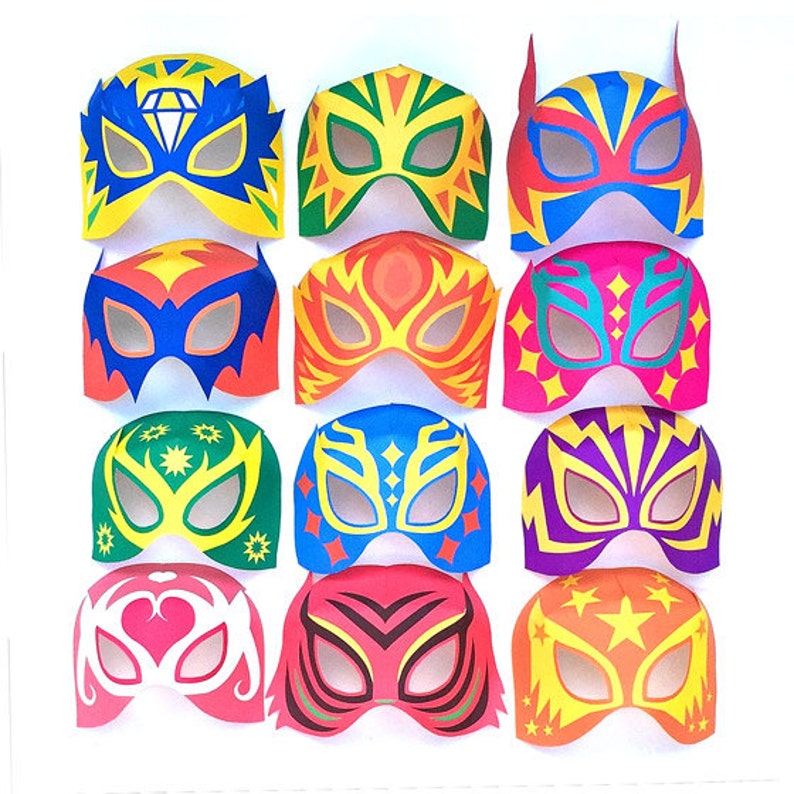 May include: Twelve colorful paper wrestling masks with different designs. The masks are all in the shape of a traditional luchador mask with a pointed top and eye holes. The masks are decorated with various patterns and colors, including red, yellow, blue, green, and black.