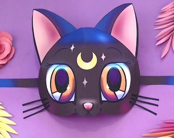 May include: A black cat mask with large, cartoon eyes and a crescent moon on the forehead. The mask is decorated with white stars and has a purple background.