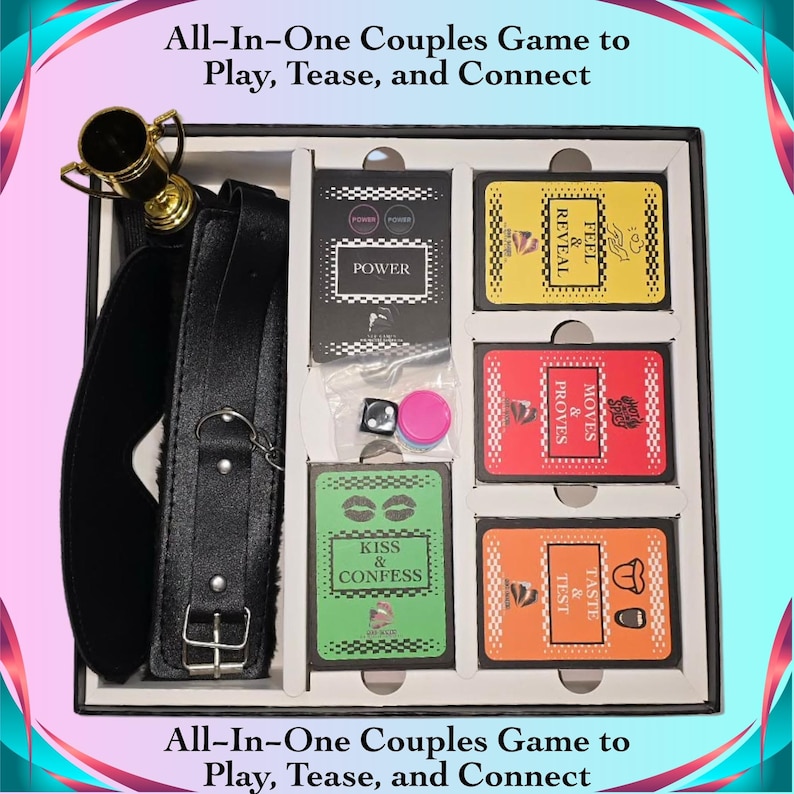 May include: An All-In-One Couples Game set in a box. The set includes cards labeled "Power", "Feel & Reveal", "Moves & Proves", "Kiss & Confess", and "Taste & Test". Also included are a blindfold, a trophy, and a black leather restraint.