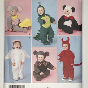 May include: Simplicity pattern for toddler costumes. The image shows six different costume designs: a mouse, a dinosaur, a panda, an angel, a bear, and a devil. The pattern size is A 1/2, 1, 2, 3, 4.