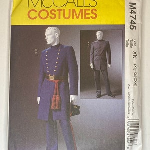 May include: A sewing pattern for a men's costume, featuring a long, dark blue coat with gold buttons and a red sash, and a pair of matching pants. The pattern is for sizes XN (extra-large) and includes instructions for making the costume. McCall's Costumes M4745.