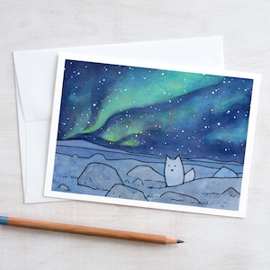 Tarjeta de la aurora boreal Tarjeta navideña con zorro ártico
