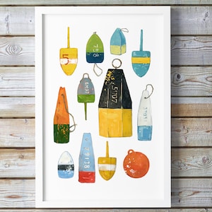 May include: A collection of 12 colorful, weathered, wooden nautical buoys with various numbers and lettering. The buoys are arranged in a random pattern on a white background.