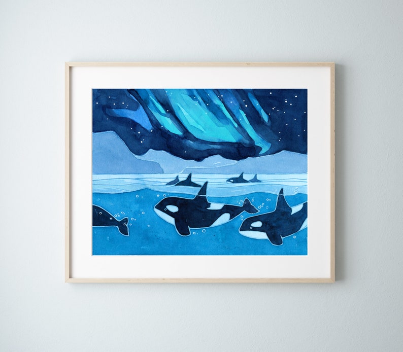May include: A watercolor painting of five orcas swimming in a dark blue ocean under a vibrant green and blue aurora borealis.