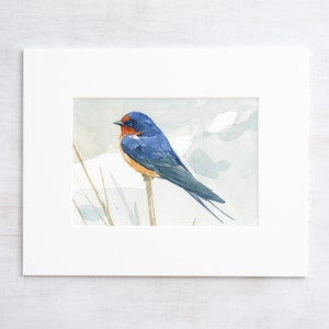 May include: Watercolor painting of a blue and red barn swallow perched on a branch. The bird is depicted in a realistic style with detailed feathers and a soft, muted background.