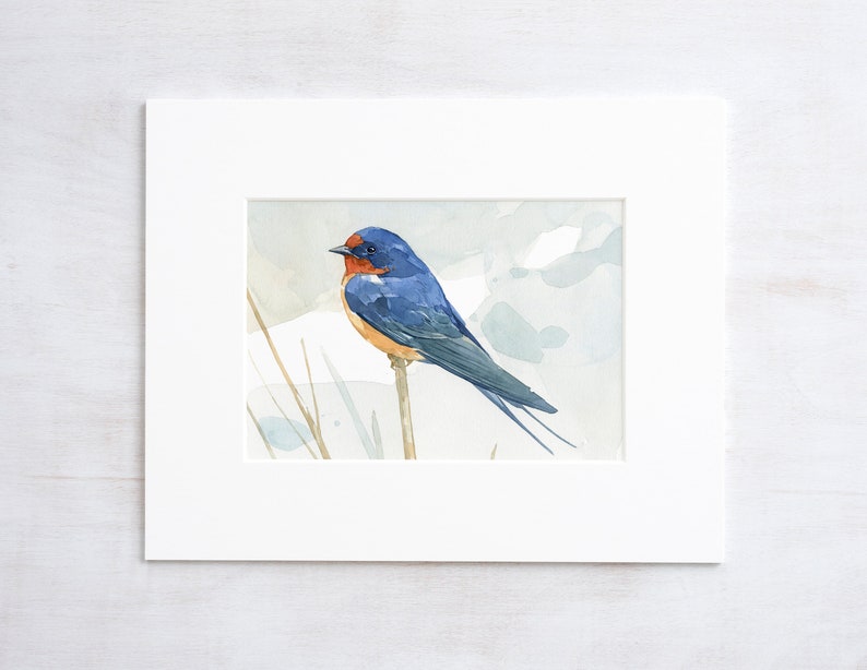 May include: Watercolor painting of a blue and red barn swallow perched on a branch. The bird is depicted in a realistic style with detailed feathers and a soft, muted background.
