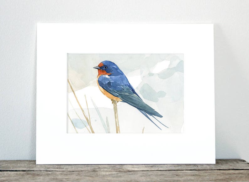 May include: Watercolor painting of a blue and orange swallow perched on a branch against a light blue and white background.