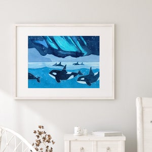 May include: A watercolor painting of a pod of orcas swimming in the ocean under a blue and green aurora borealis. The orcas are black and white and the water is a deep blue.