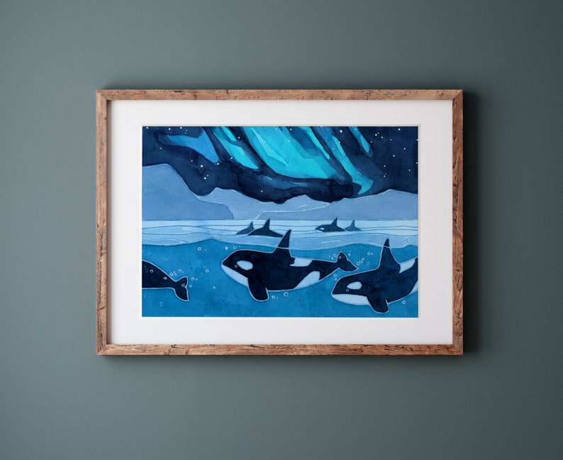 May include: A watercolor painting of five orcas swimming in the ocean under a blue and green aurora borealis. The orcas are black and white and the water is a deep blue. The aurora borealis is a vibrant blue and green.