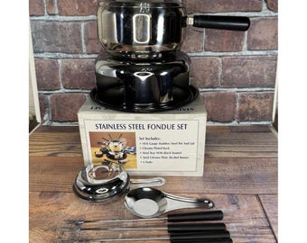 Juego de fondue vintage de acero inoxidable con 6 tenedores, olla con asa, rejilla, bandeja y quemador.