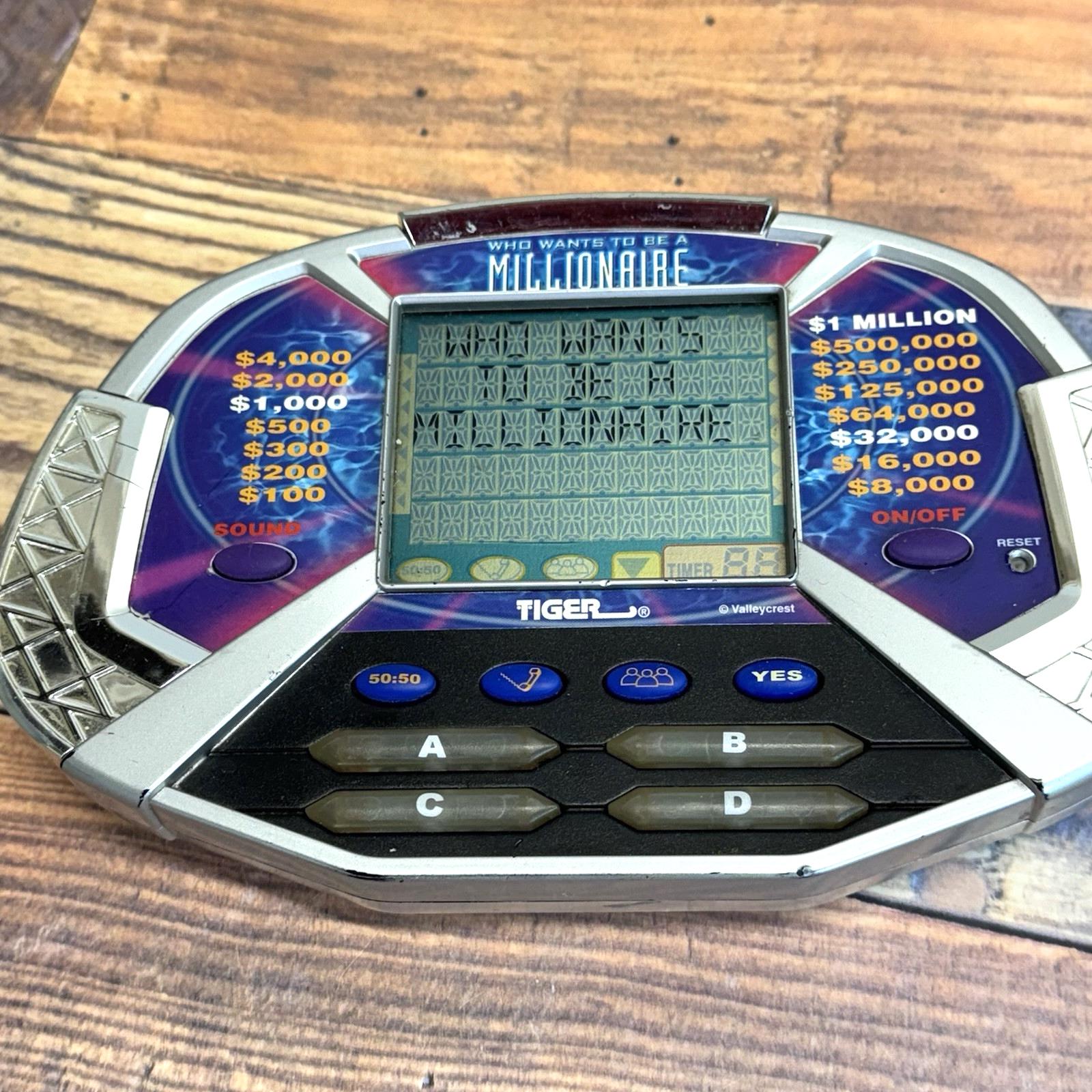 Who Wants to Be A Millionaire Handheld Electronic Game Tiger W