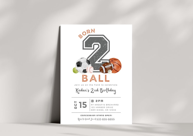 May include: A sports-themed birthday invitation for a 2-year-old. The invitation features a large gray number "2" with a basketball, football, soccer ball, and baseball in front of it. The text "Born 2 Ball" is at the top of the invitation, and the text "Kaden's 2nd Birthday" is below the number. The invitation also includes the date, time, and location of the party.